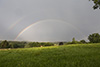 Regenbogen bei Penzberg an der Gewitterrückseite: